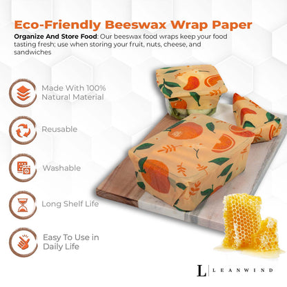 Eco-friendly beeswax wrap paper product image with orange fruit pattern, displayed on a wooden board. Five icons highlight features: 100% natural material, reusable, washable, long shelf life, and easy to use. Honeycomb image in corner. Leanwind logo at bottom.